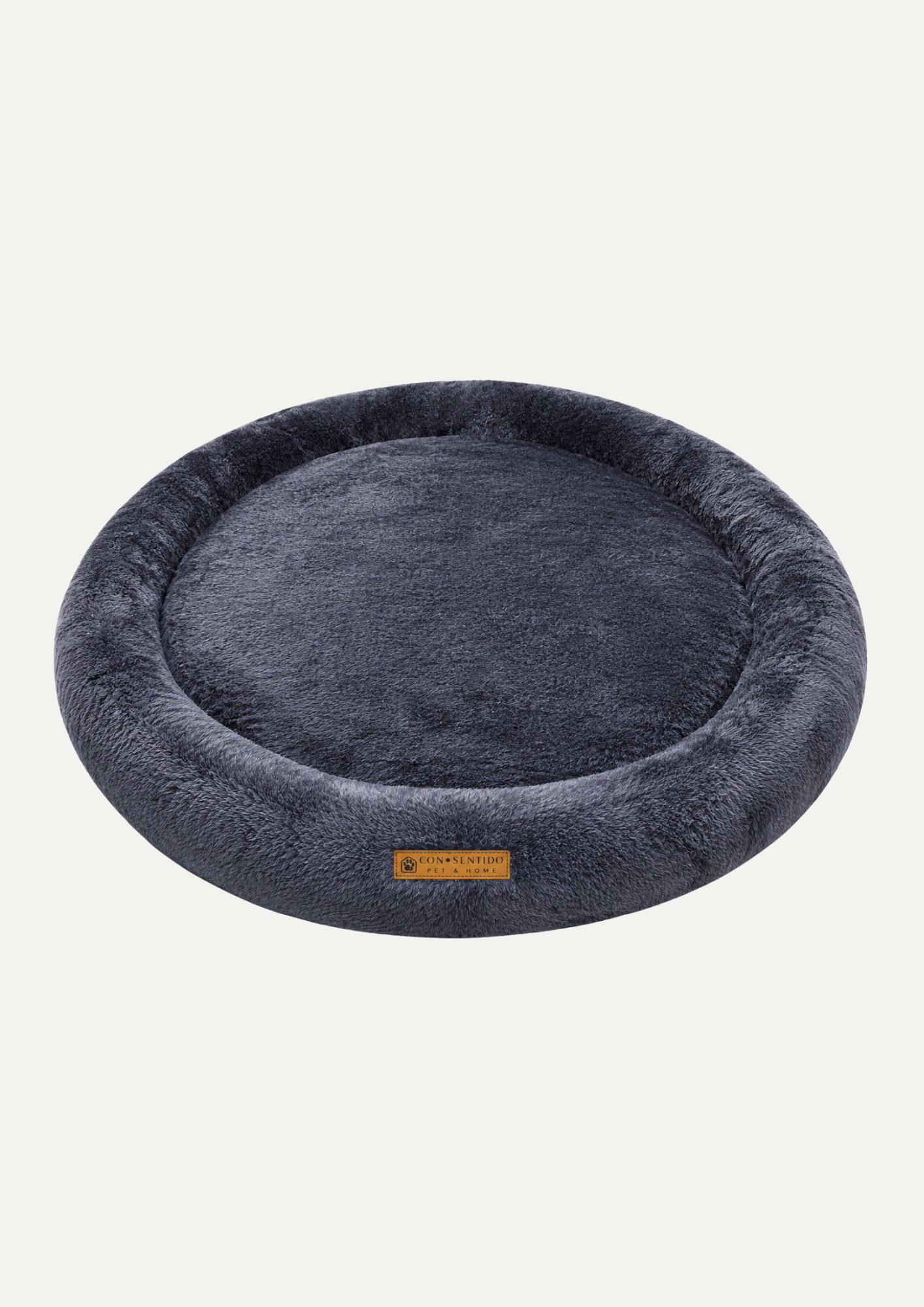 Cama Dona Roble para perros y gatos con centro ortopédico de espuma, bordes acolchados y acabado en tela suave color azul oscuro, ideal para un descanso reparador.