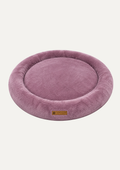Cama Dona Roble para perros y gatos con centro ortopédico de espuma, bordes acolchados y acabado en tela suave color rosado, ideal para un descanso reparador.